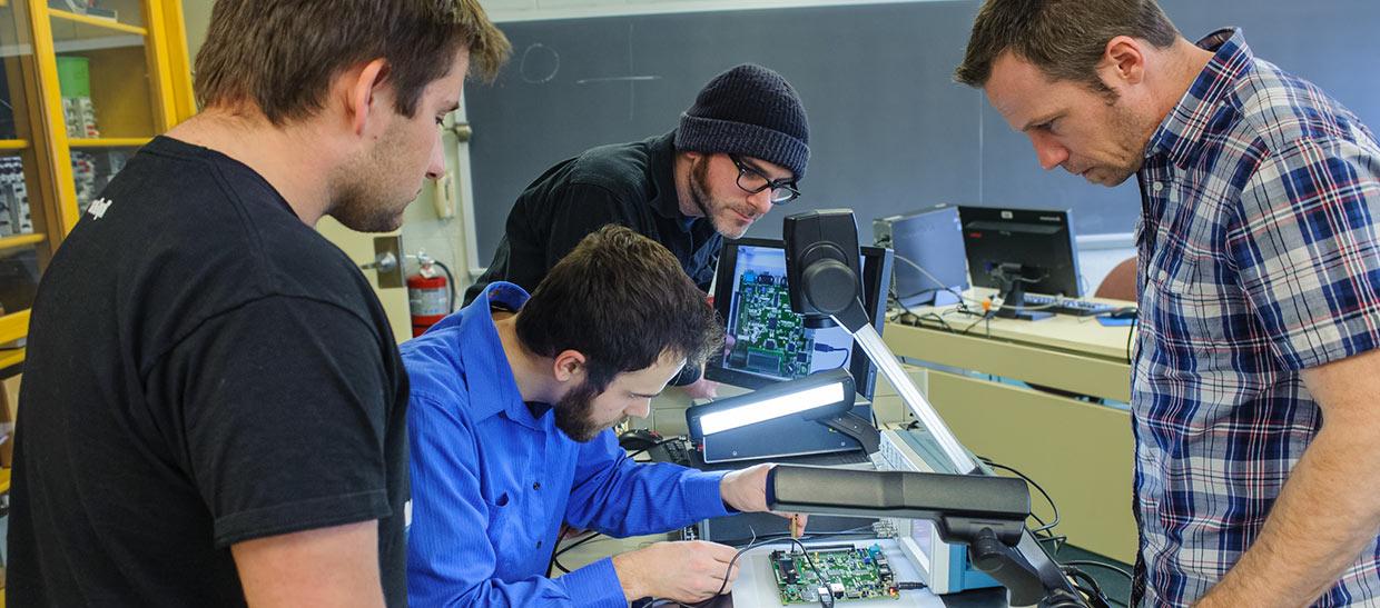 Students and instructor working in a classroom